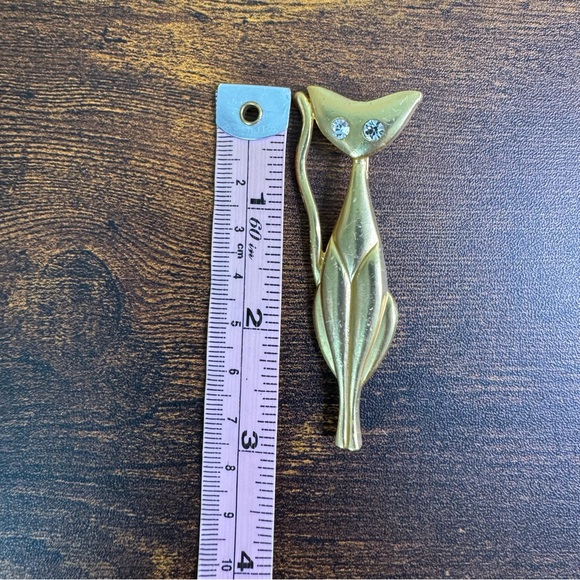Gold Tone Slim Cat Brooch with Rhinestone Eyes - Picture 10 of 11